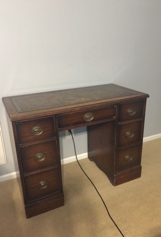 Antique leather top desk.