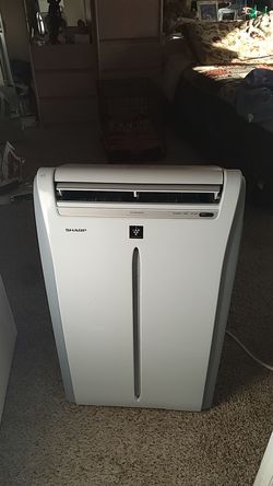 Sharp Portable AC and ion generator in excellent condition with remote.