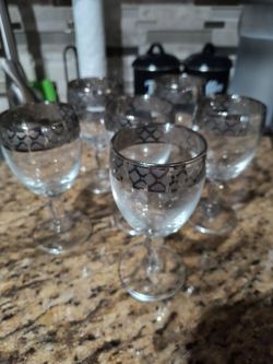 These are vintage J. Prezioso "Lavorato A Mano" Italian silver-rimmed goblets featuring a pattern