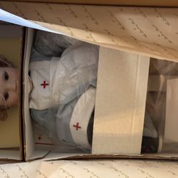 The Shirley Temple Red Cross Doll 