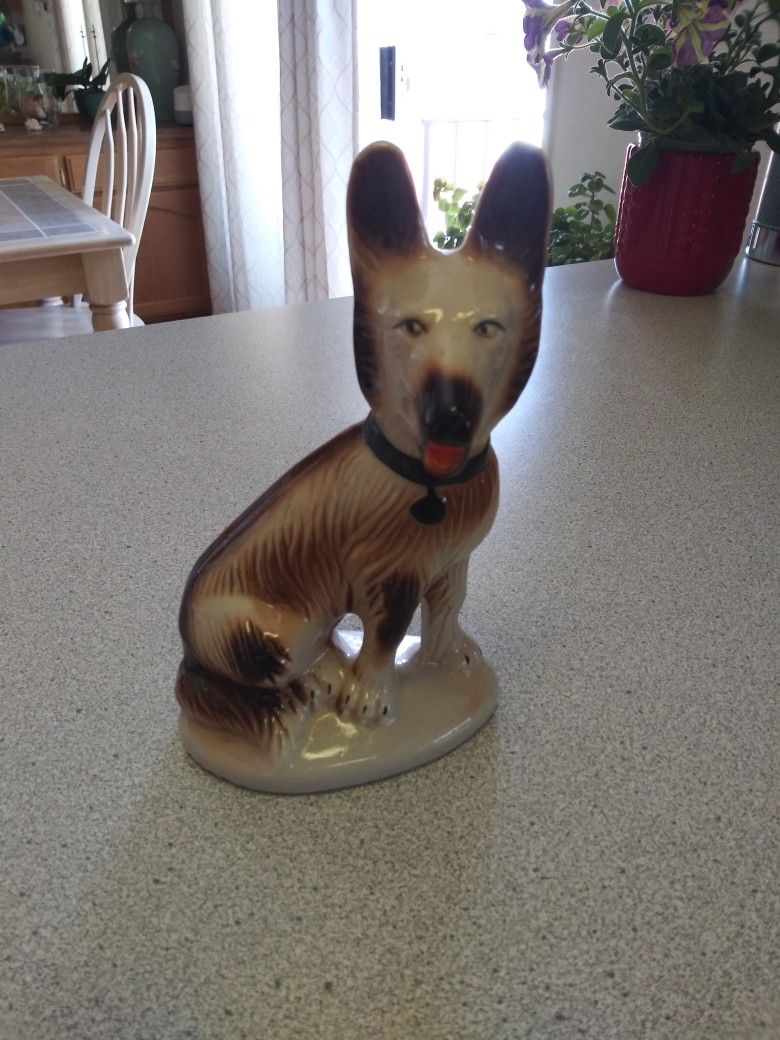 Porcelain German Shepard Statue.