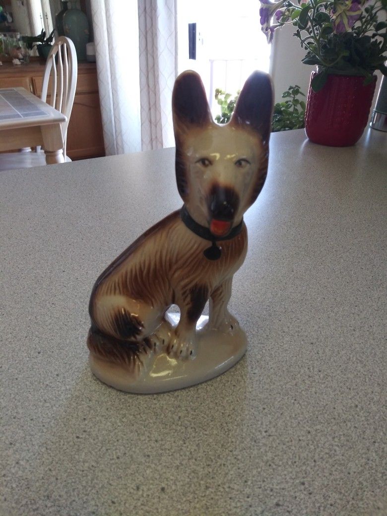 Porcelain German Shepard Statue. 