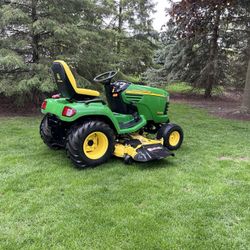 John Deere X495 Commercial Garden Tractor Lawn Mower With 62 Inch Deck And 24 HP Diesel Engine 