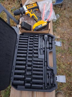 Tools set and drill with battery charger
