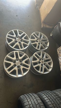 16” OEM Nissan frontier rims ,, firm price,,,,