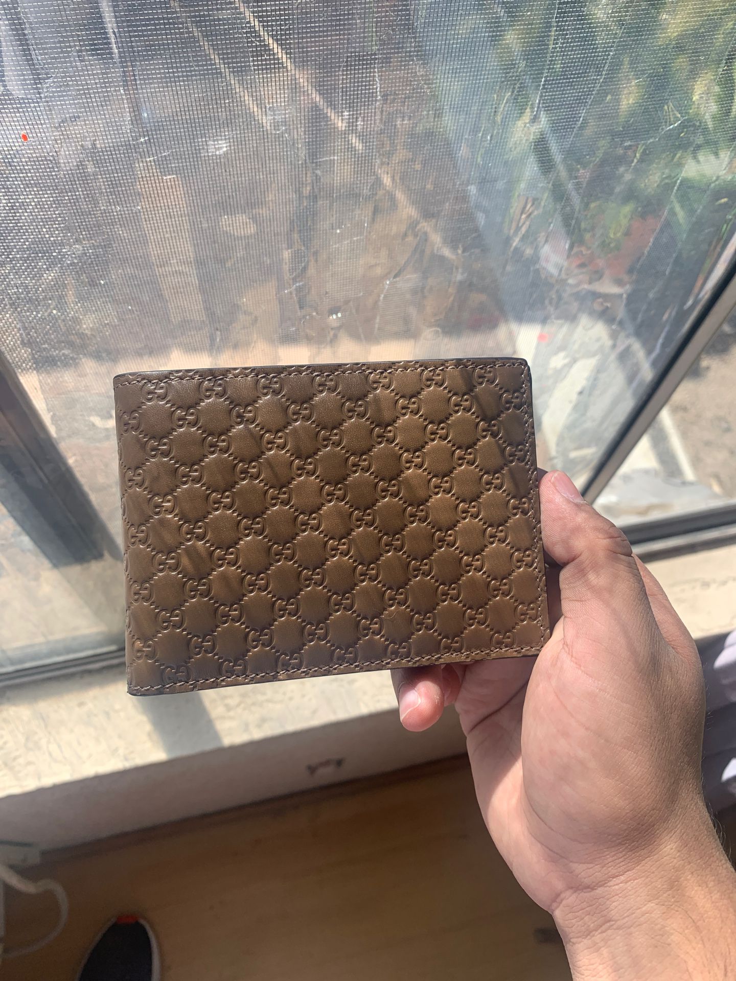 Gucci Men’s leather wallet