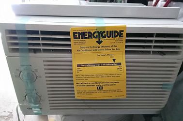 GoldStar R5050A4 window air conditioner label detailing a cooling capacity of 5,050 BTUs.