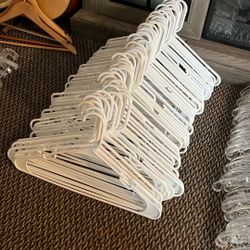 White plastic hangers