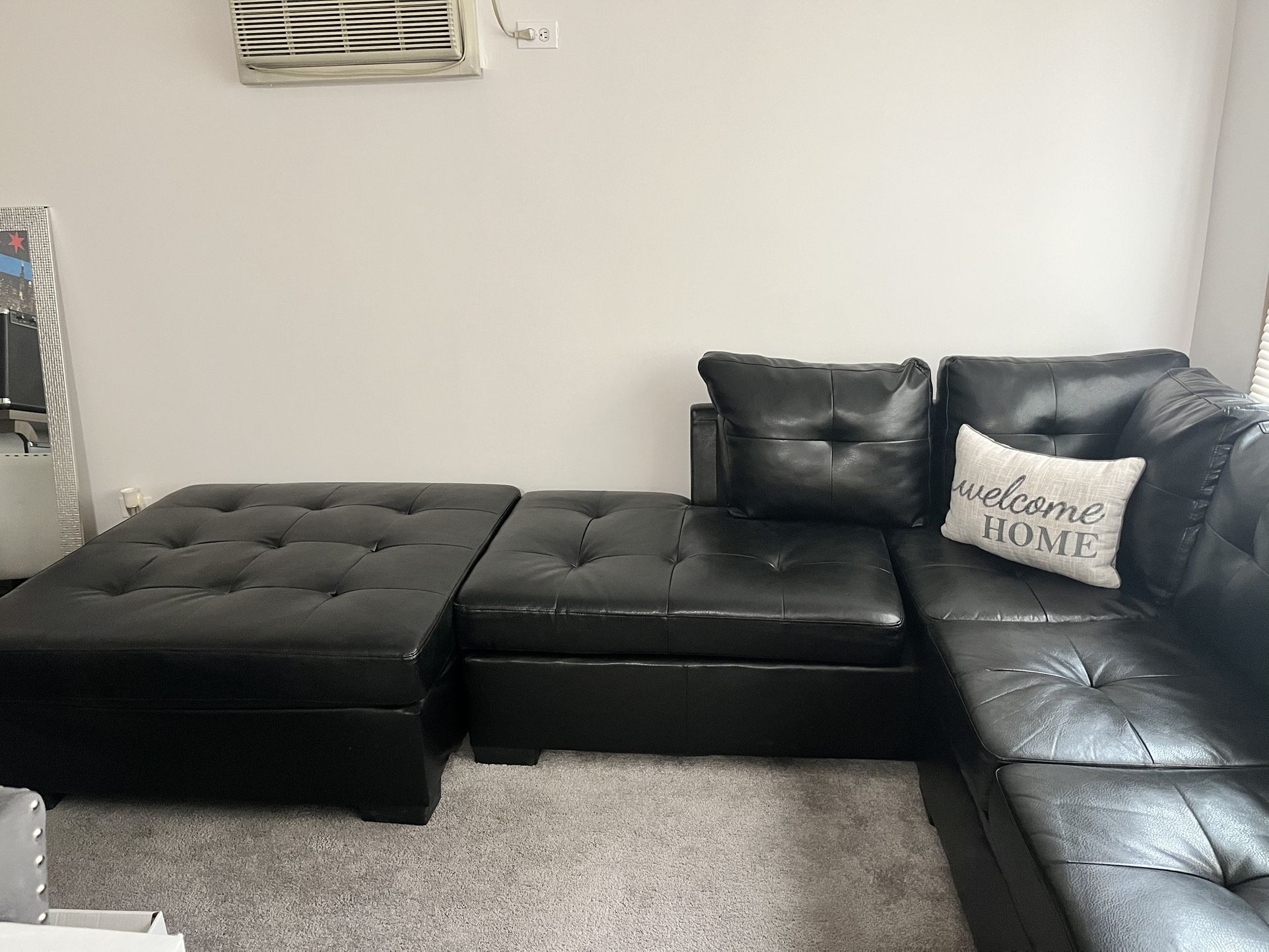 Black Sectional With Ottoman 