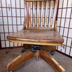 Vintage  rolling chair on casters