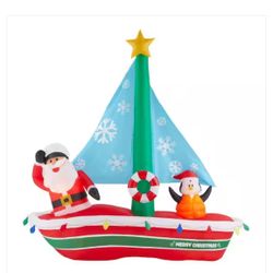 Santa In sailboat Christmas Inflatable