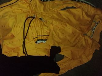 Need gone today -yellow women's champain sweat suit