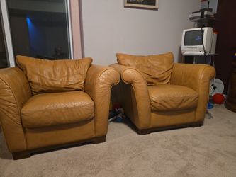 Italarm Leather Chairs.