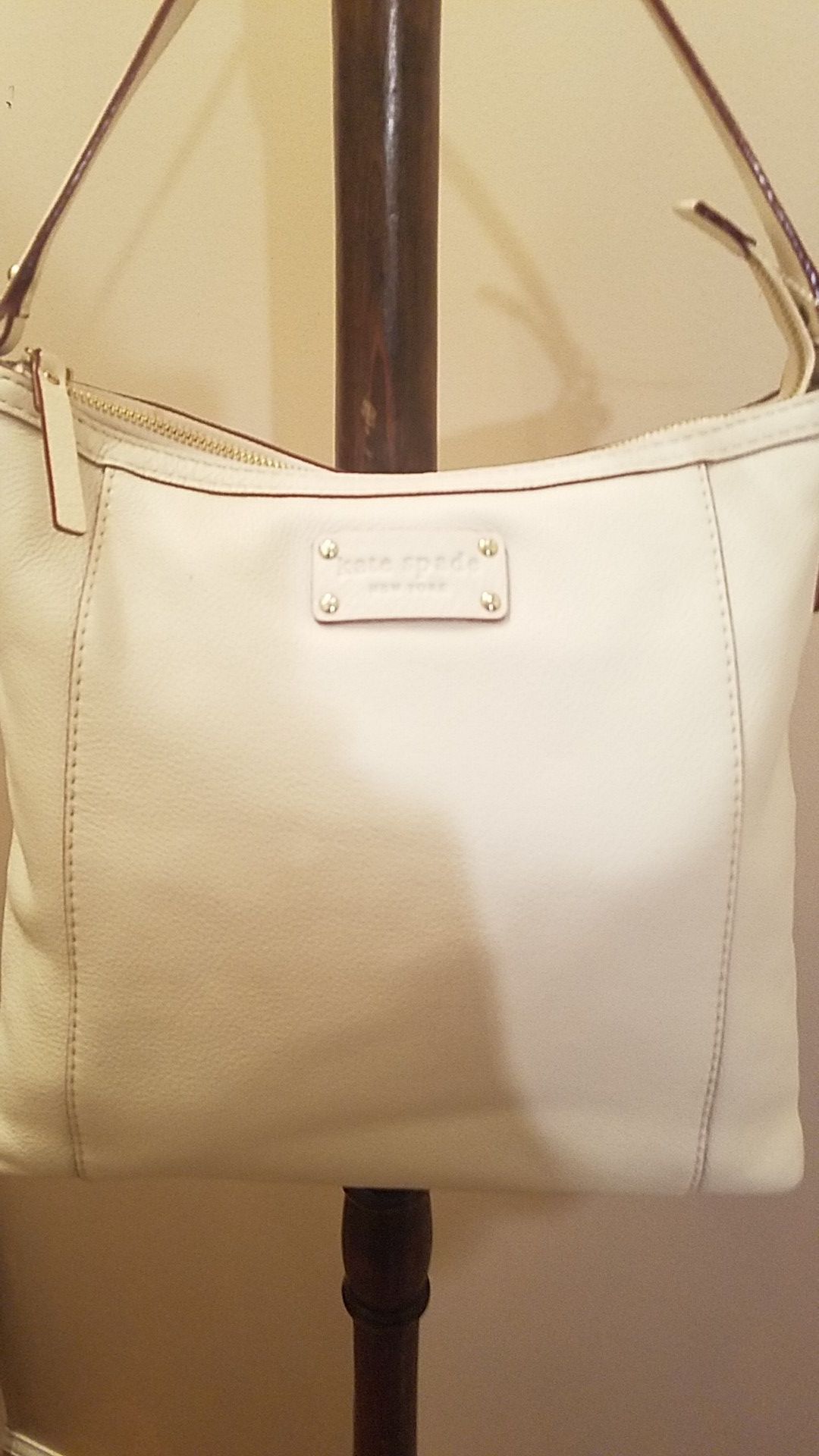 New Kate Spade bag rich cream color goes with any thing