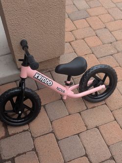 Toddler balance bike. Pink