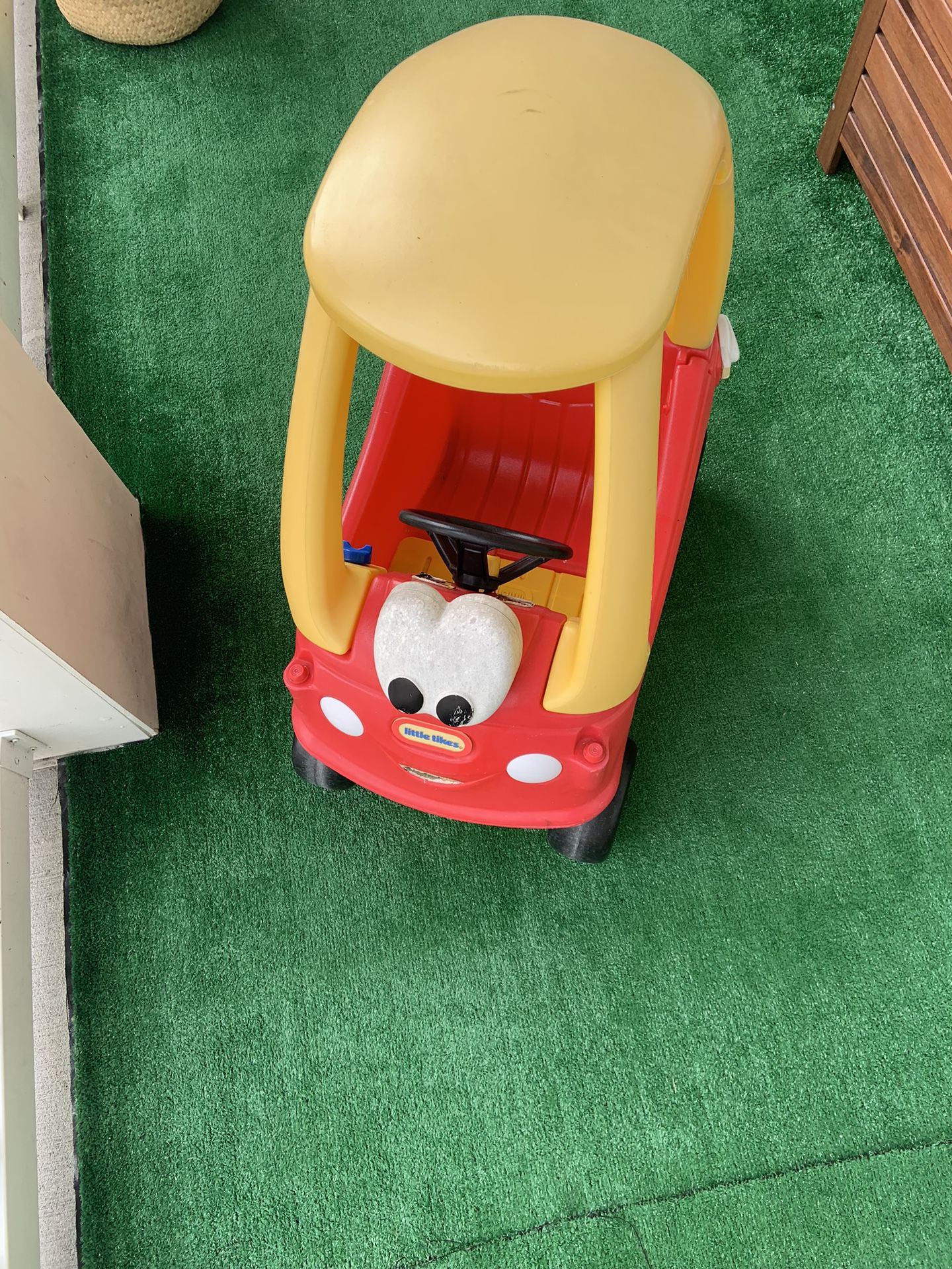 The Little Tikes Cozy Coupe ride on toy