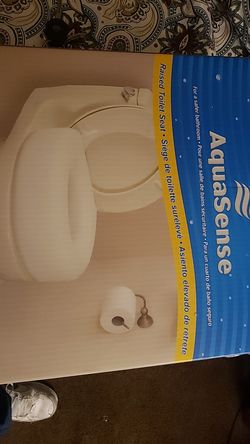 Raised toilet seat