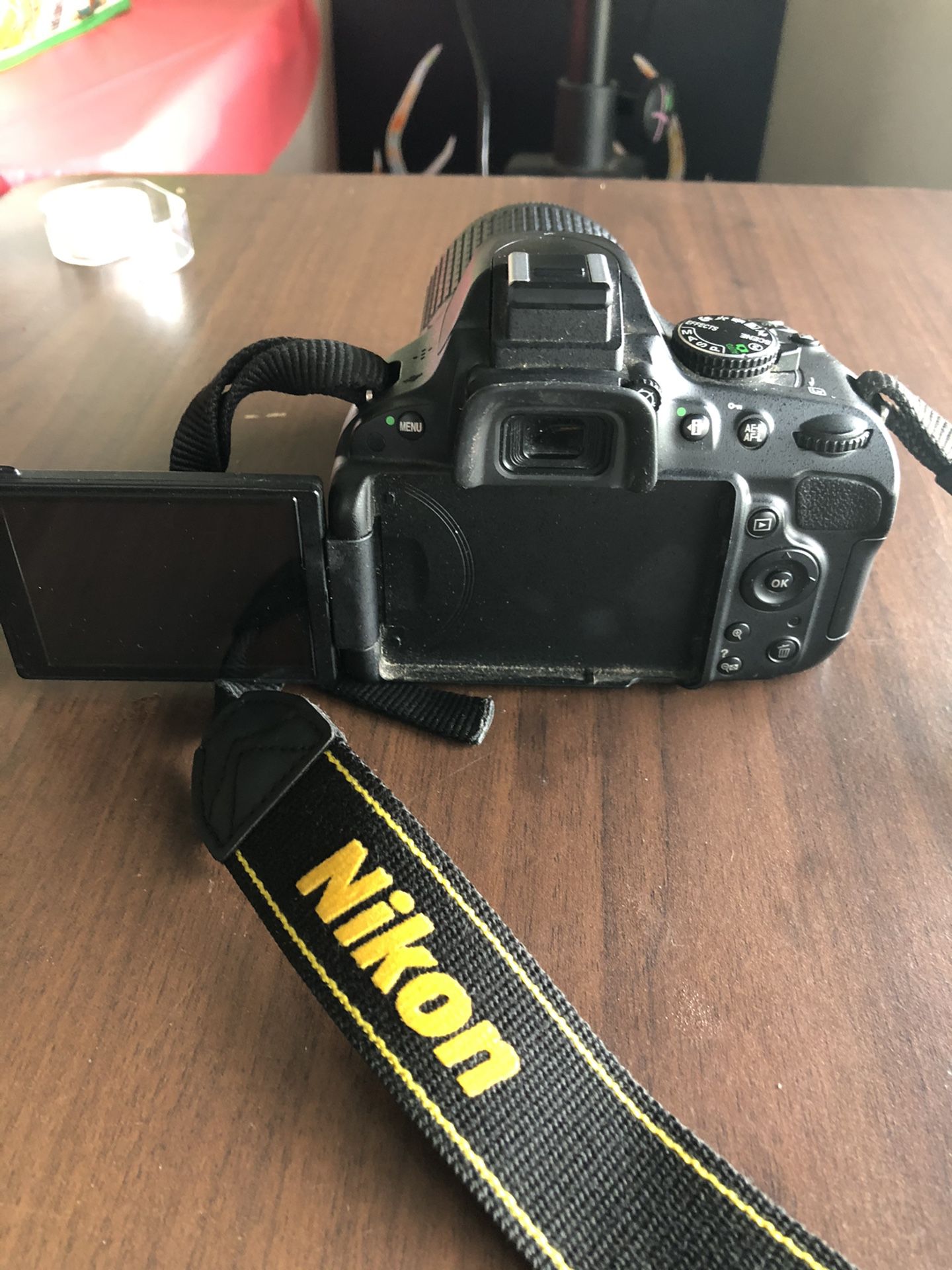Nikon d5100 dslr camera with dx 55-200mm lens. With video