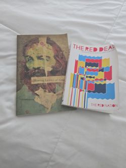 The red deal and mowing leaves of grass