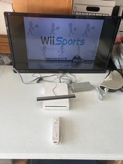 Nintendo Wii RVL-001 console system with controller and cords. No Games.
