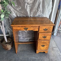 Solid wood antique writing desk with four drawers