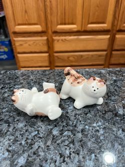 Ceramic Striped Cats Pair of Salt and Pepper Shakers.  Size approximately tallest 2 1/2 inches tall.  Made by Takahashi, Japan with foil stickers on t