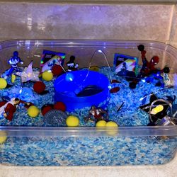 Rice Sensory Bin- Super Hero Themed