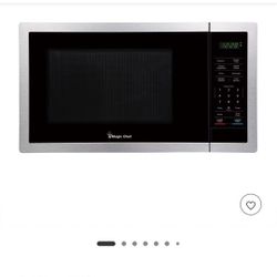 Magic Chef 900 Watt 0.9 Cu Ft Digital Touch Small Countertop Microwave, Silver ,used great condition 
