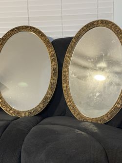 ornate gold oval mirrors measuring 30” x 21”