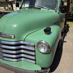 52 Chevy flatbed truck and perfect daily driving condition