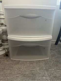 2 plastic drawer bins