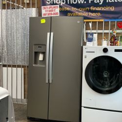 Cruz’s Appliances      GE. Refrigerator