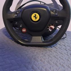 Thrustmaster T80 Ferrari, steering wheel and petals.