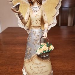 Hand Crafted Angel 9" Tall.  New In box never used. $18.00  OBO.