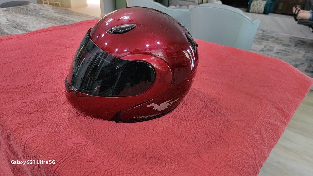 FOUR MOTORCYCLE HELMETS