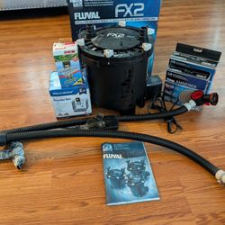 Fluval Fx2 used in good condition with box and extra accessories.