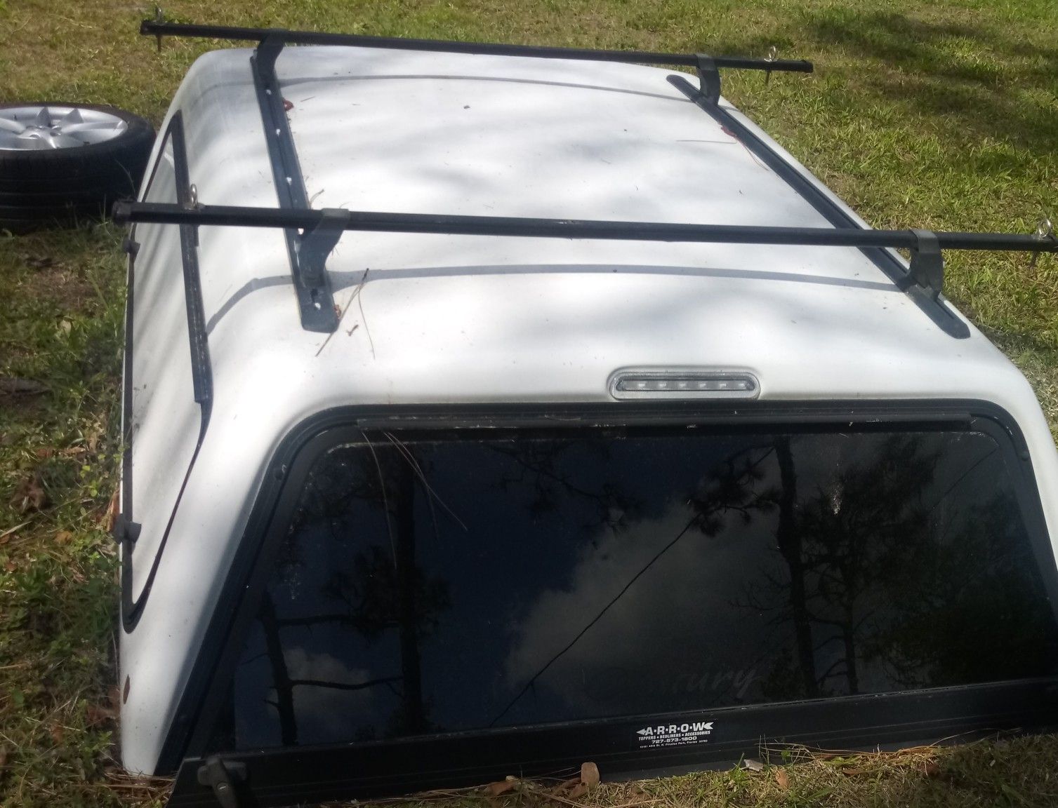 Camper top for a short bed truck