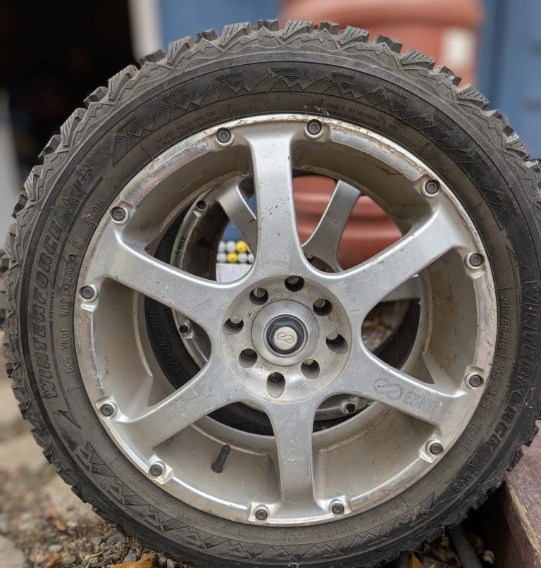 Studded Snow Tires on Aluminum Rims