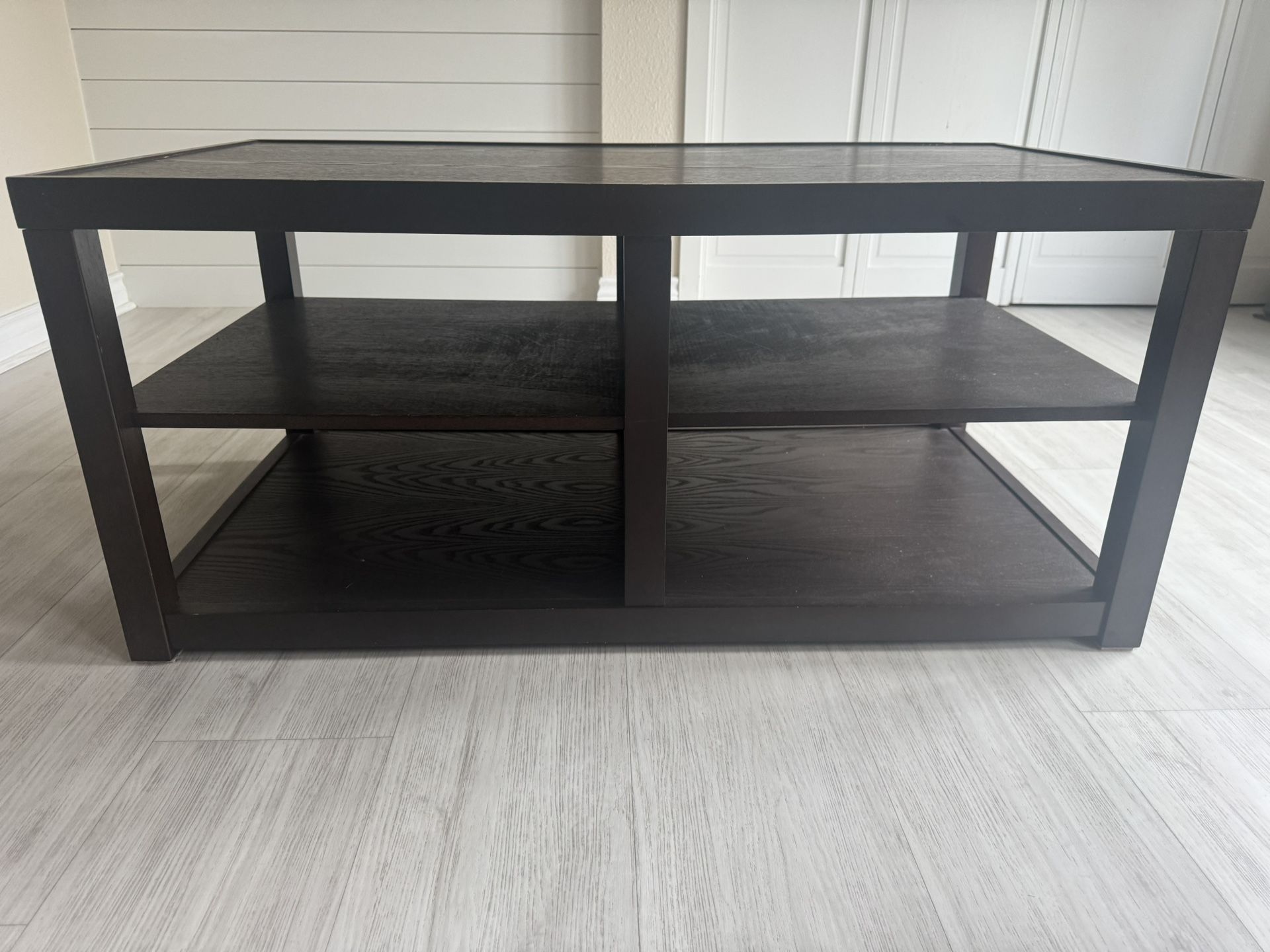 Dark brown wooden coffee table