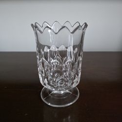 Lead crystal footed vase with scalloped rim and decorative pattern, made in Poland