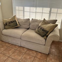 Beige Couch, Two Pillows