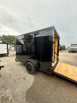 Trailer enclosed 6 x 10 polycore 0.80 it’s 2026