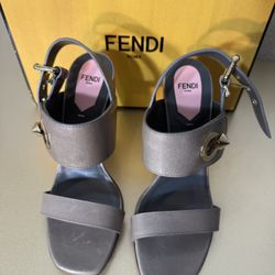 Fendi Women Sandals In Gray With Wood Heel & Light Gold Hardware.