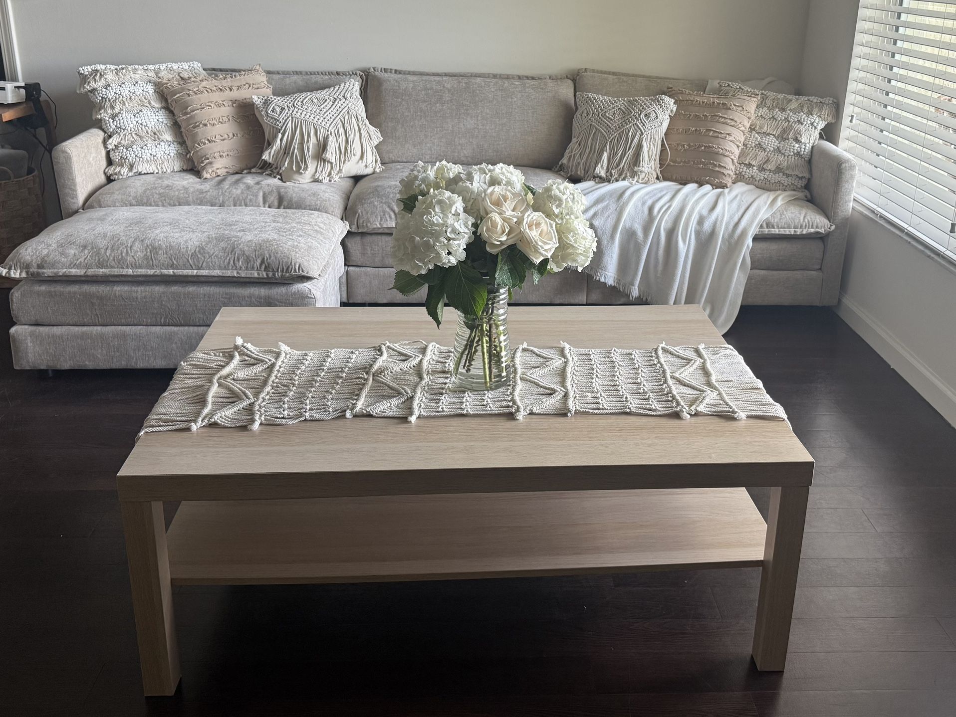 Sofa for sale with table, blanket and cushions