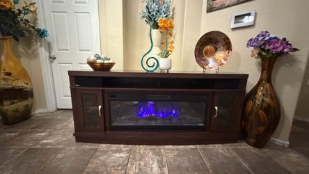 Beautiful fireplace /tv stand with bluetooth speakers 70”