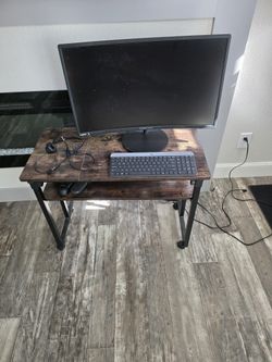 Work from home set up!
Tribesigns Adjustable  Laptop Table on Wheels and Sceptre 27" Curved monitor