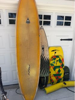 kids trek bike, surfboards
