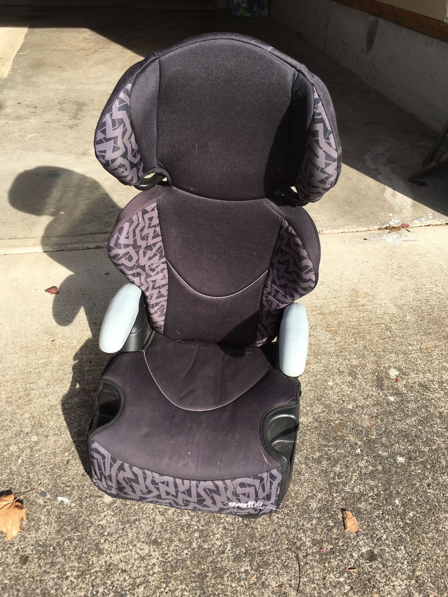Booster with detachable back