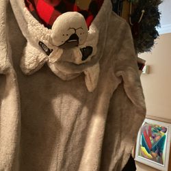 A Small Beautiful Pajama To Keep You Warm For The Winter.  Very Good Quality, I Have One And I Love It