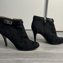 Authentic coach size 6 1/2 black heeled ankle bootie shoes with silver accent buckle